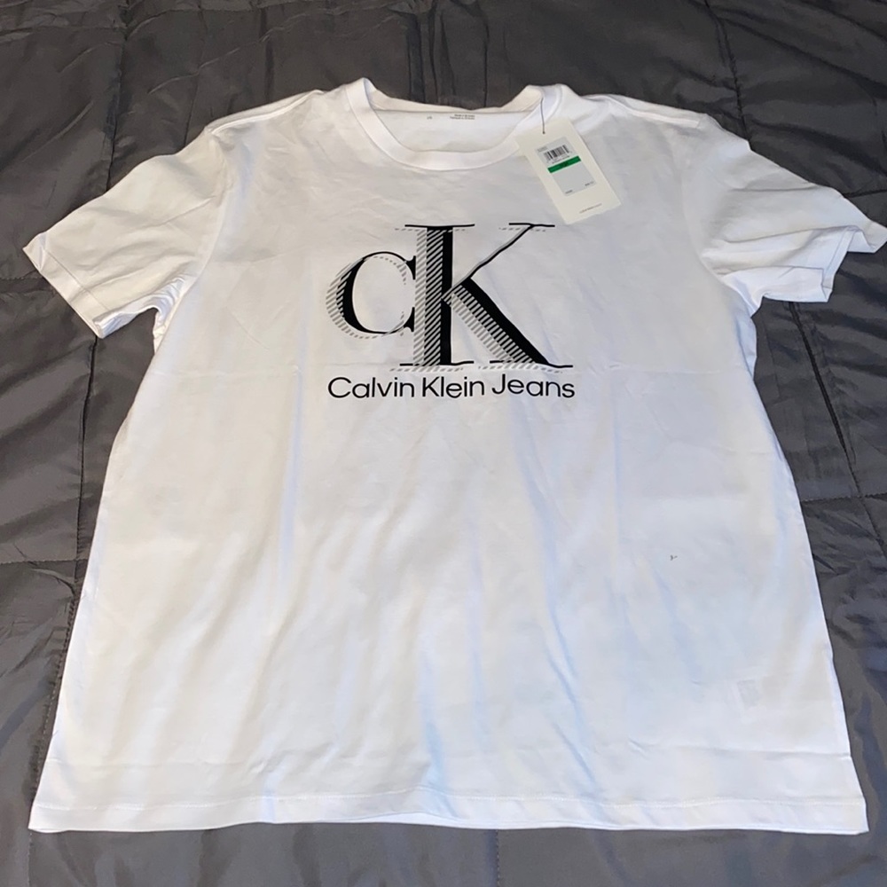 White, Calvin Klein Tee Shirt.